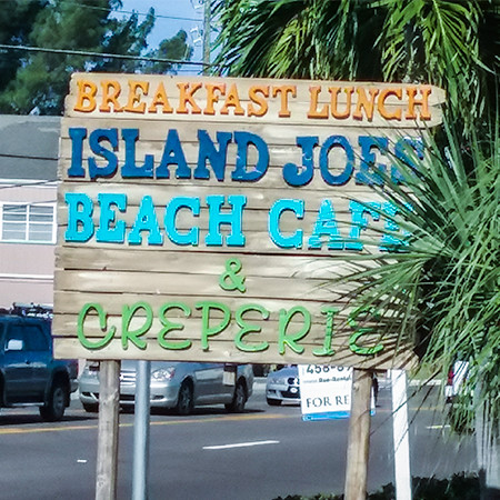 street sign for Island Joe's Beach Cafe