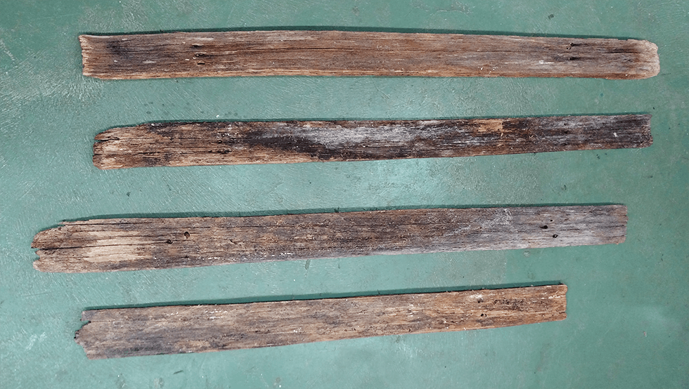 Raw wood fence pickets